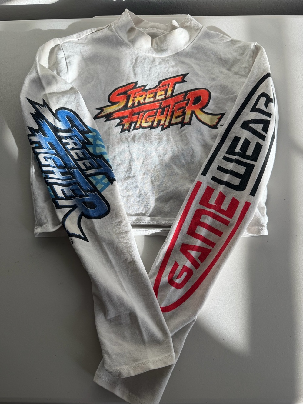 White Graphic Long-Sleeve Crop Top